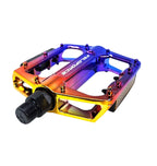PEDAL PLATAFORMA FREESTYLE 9/16 ALUMÍNIO ESFERADO COM REFLETOR RAINBOW