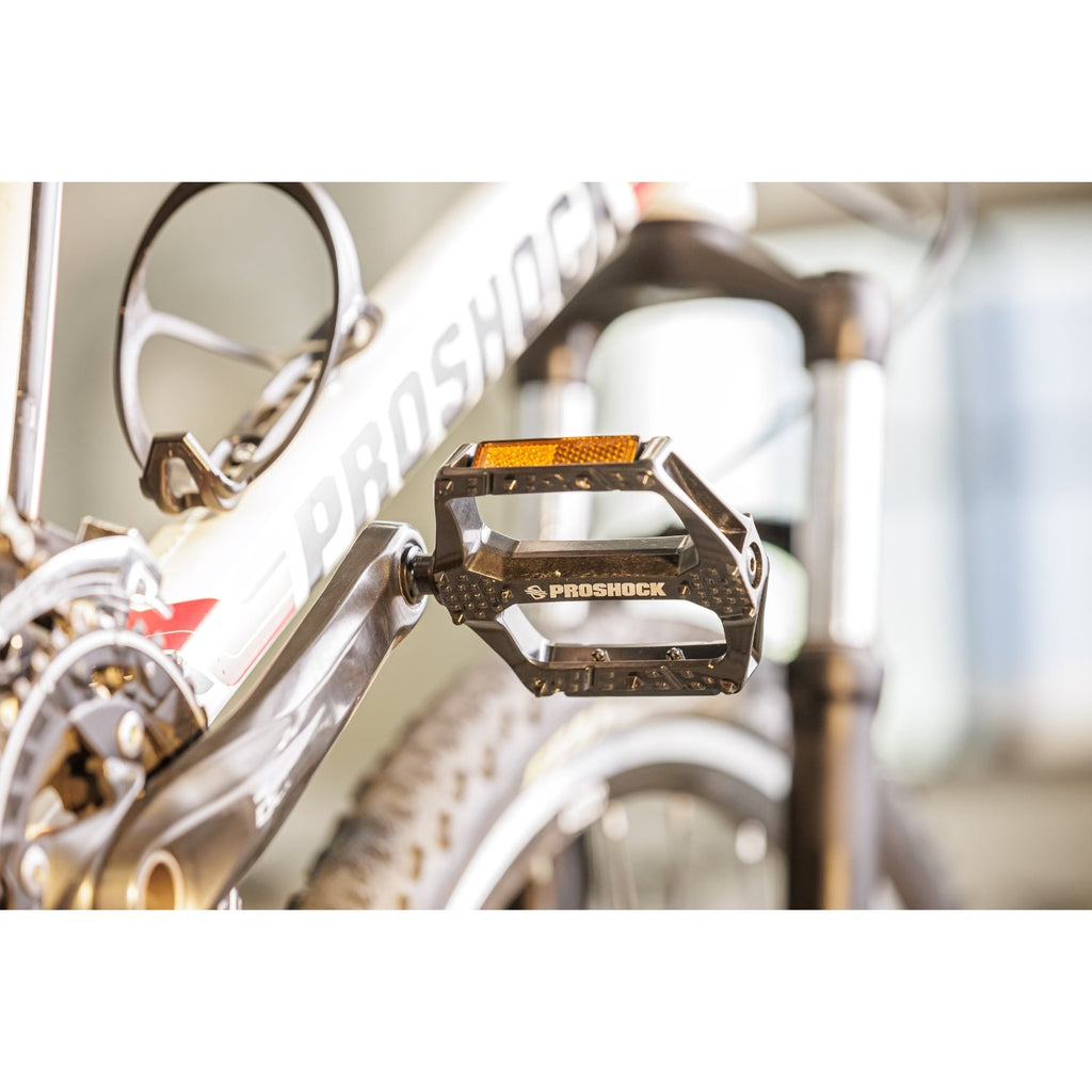 PEDAL PLATAFORMA PROSHOCK ALUMINIO EIXO CROMOLY ROSCA 9/16 PRETO