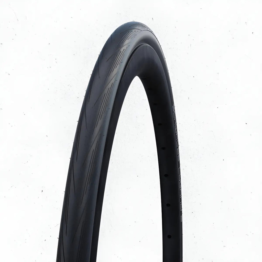 Pneu Schwalbe Lugano K-Guard 700x23C 50 TPI com Arame - Preto