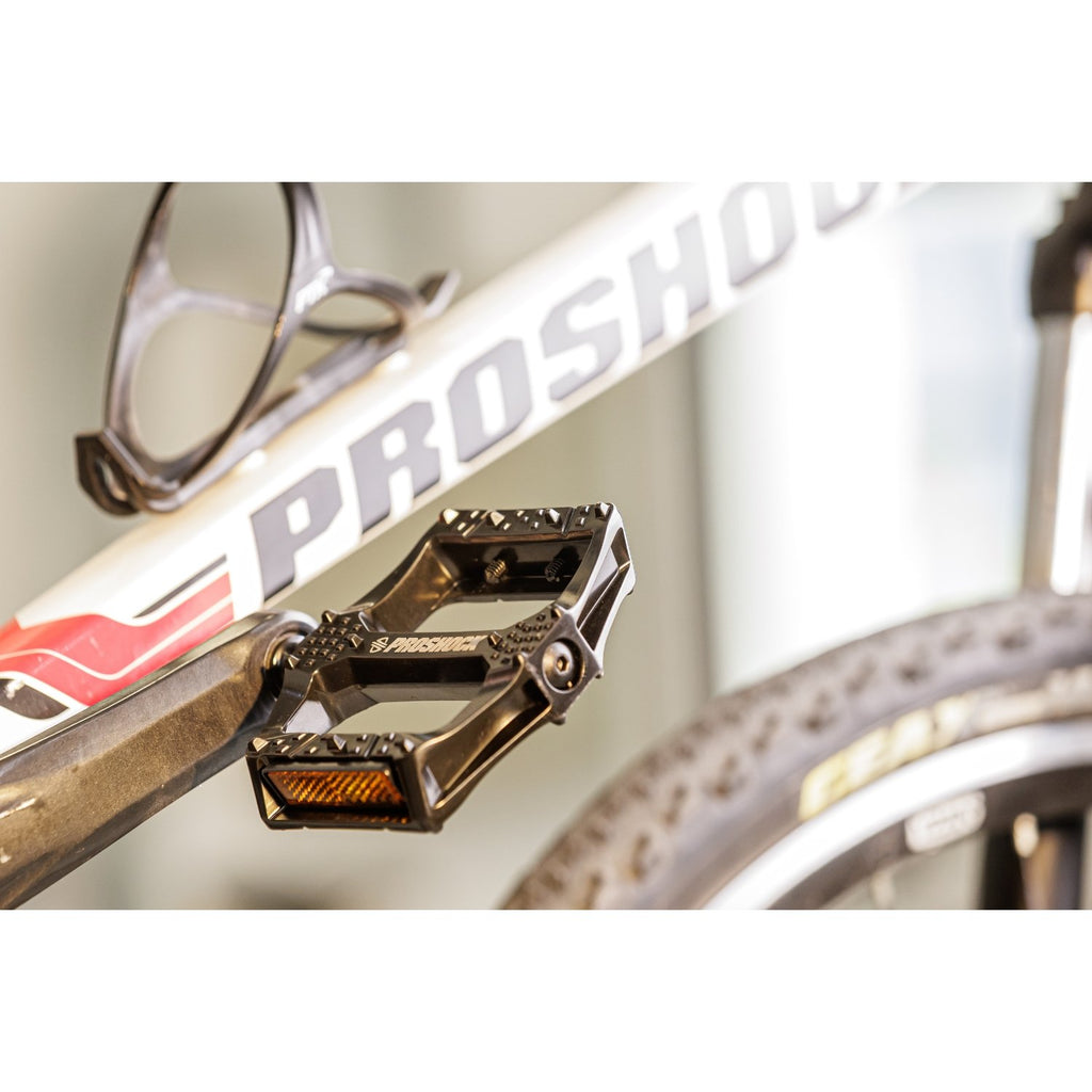 PEDAL PLATAFORMA PROSHOCK ALUMINIO EIXO CROMOLY ROSCA 9/16 PRETO