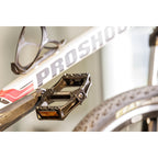 PEDAL PLATAFORMA PROSHOCK ALUMINIO EIXO CROMOLY ROSCA 9/16 PRETO